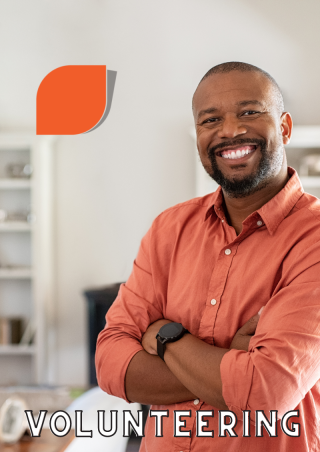 Image of male standing looking pleased with himself and caption Volunteering